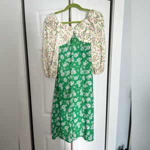 Dressed in Lala floral dress. New with tags